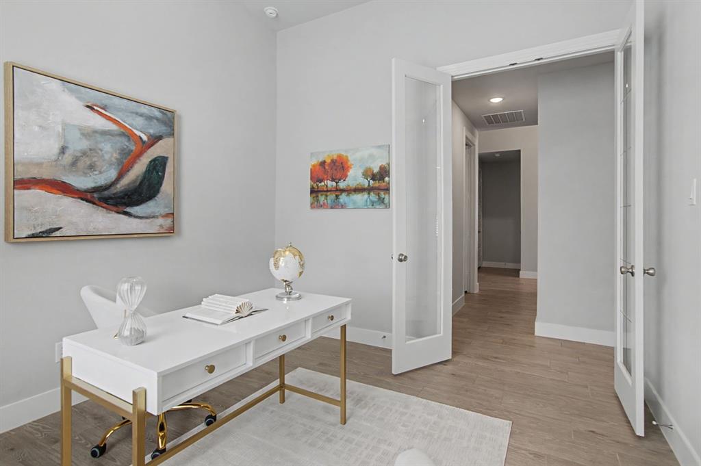 1101 Claiborne Drive Aubrey, TX 76227 - Photo 21 of 40 a view of a room that has a table and chairs in it