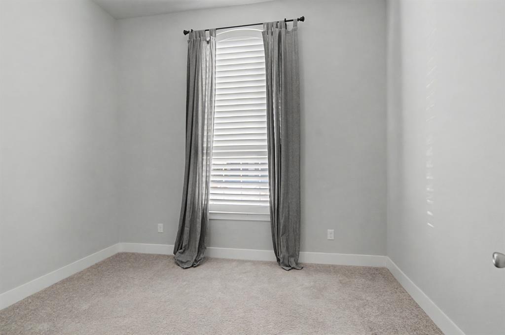 1101 Claiborne Drive Aubrey, TX 76227 - Photo 23 of 40 an empty room with a window