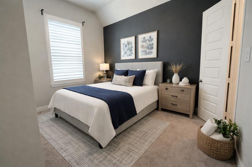 1101 Claiborne Drive Aubrey, TX 76227 - Photo 24 of 40 a bedroom with bed and a window