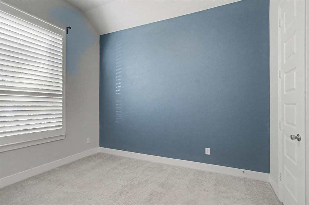 1101 Claiborne Drive Aubrey, TX 76227 - Photo 25 of 40 an empty room with a window