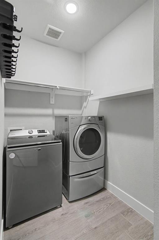 1101 Claiborne Drive Aubrey, TX 76227 - Photo 28 of 40 a utility room with dryer and washer