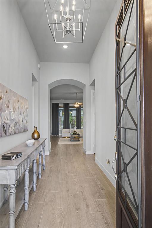 1101 Claiborne Drive Aubrey, TX 76227 - Photo 3 of 40 a view of a livingroom with furniture window and hardwood floor