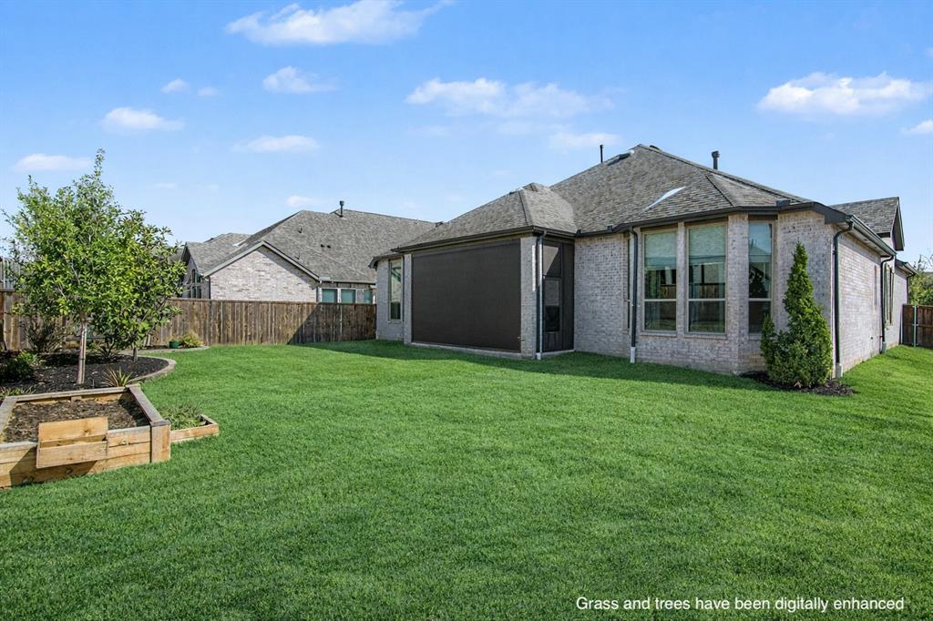 1101 Claiborne Drive Aubrey, TX 76227 - Photo 32 of 40 a view of a house with a yard