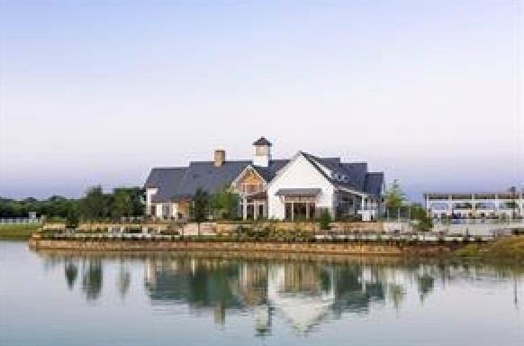 1101 Claiborne Drive Aubrey, TX 76227 - Photo 39 of 40 a view of a house with a lake view