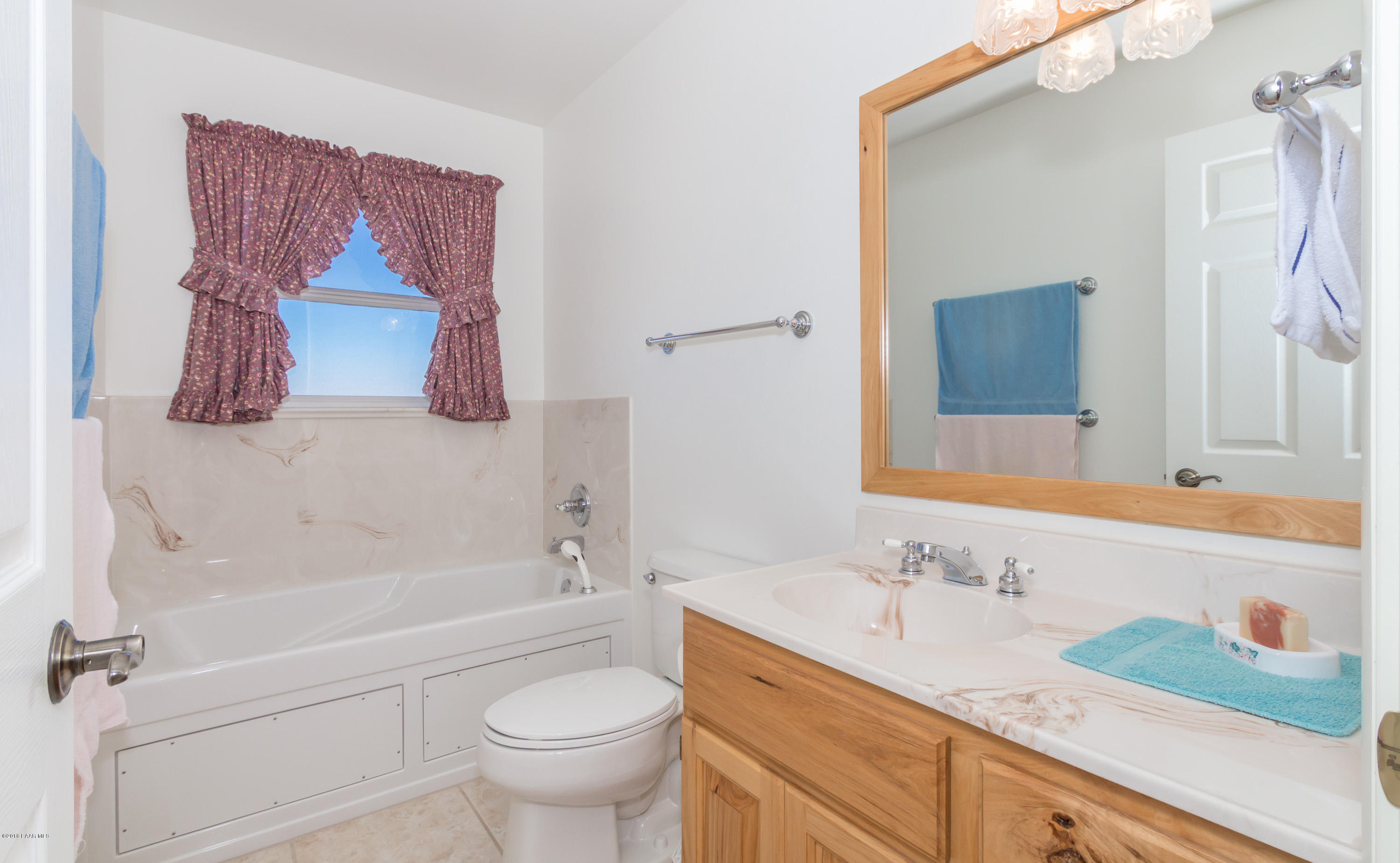 1050 Ranch House Road Paulden, AZ 86334 - Photo 11 of 19 a bathroom with a sink a toilet and a bathtub