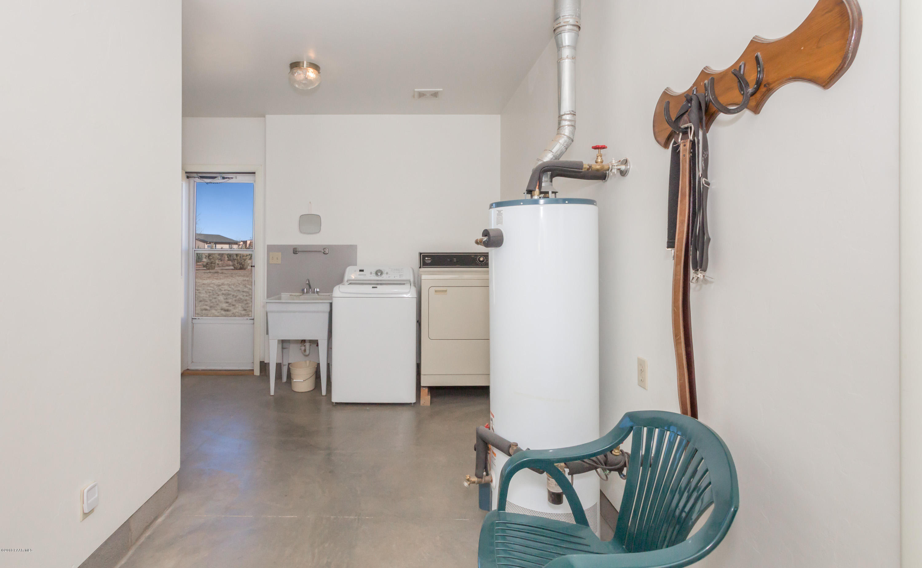 1050 Ranch House Road Paulden, AZ 86334 - Photo 14 of 19 a view of kitchen and living room