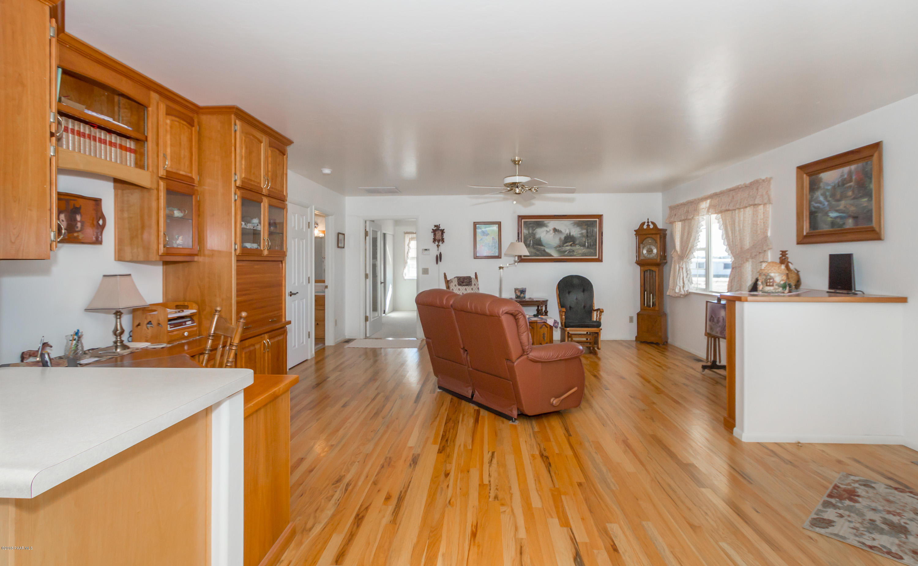 1050 Ranch House Road Paulden, AZ 86334 - Photo 2 of 19 a living room with furniture and a wooden floor