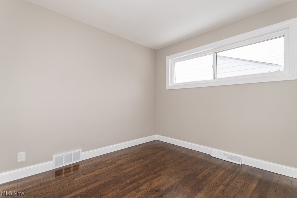 4980 Emmet Road Lyndhurst, OH 44124 - Photo 28 of 39 Unfurnished room with dark hardwood / wood-style flooring