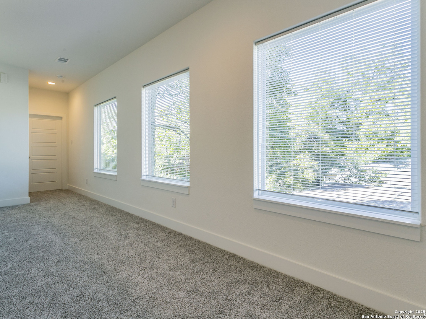 1430 Hays Street, Unit 101 San Antonio, TX 78202 - Photo 17 of 25 a view of an empty room with a window