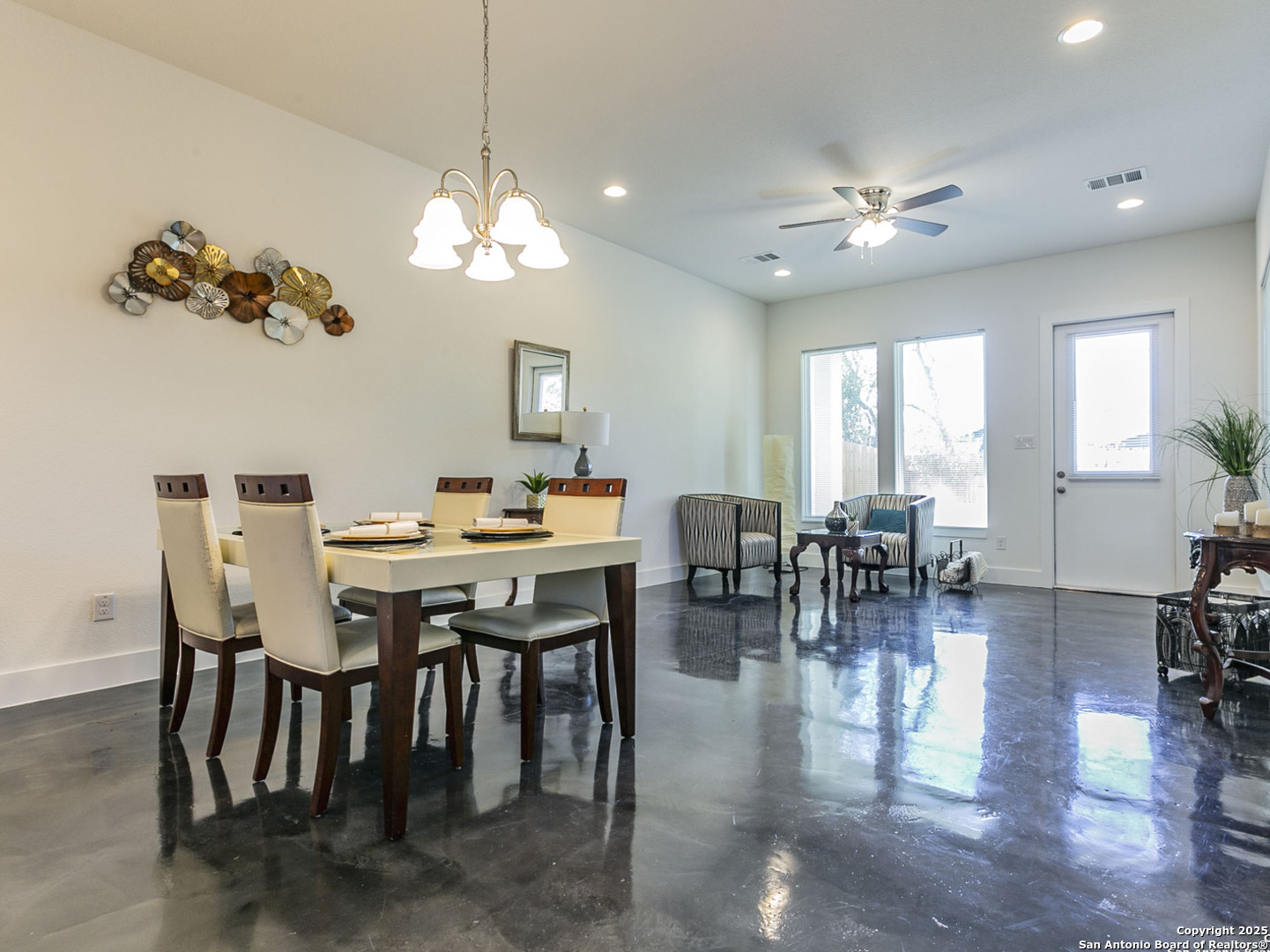 1430 Hays Street, Unit 101 San Antonio, TX 78202 - Photo 5 of 25 a view of a dining room with furniture window and wooden floor