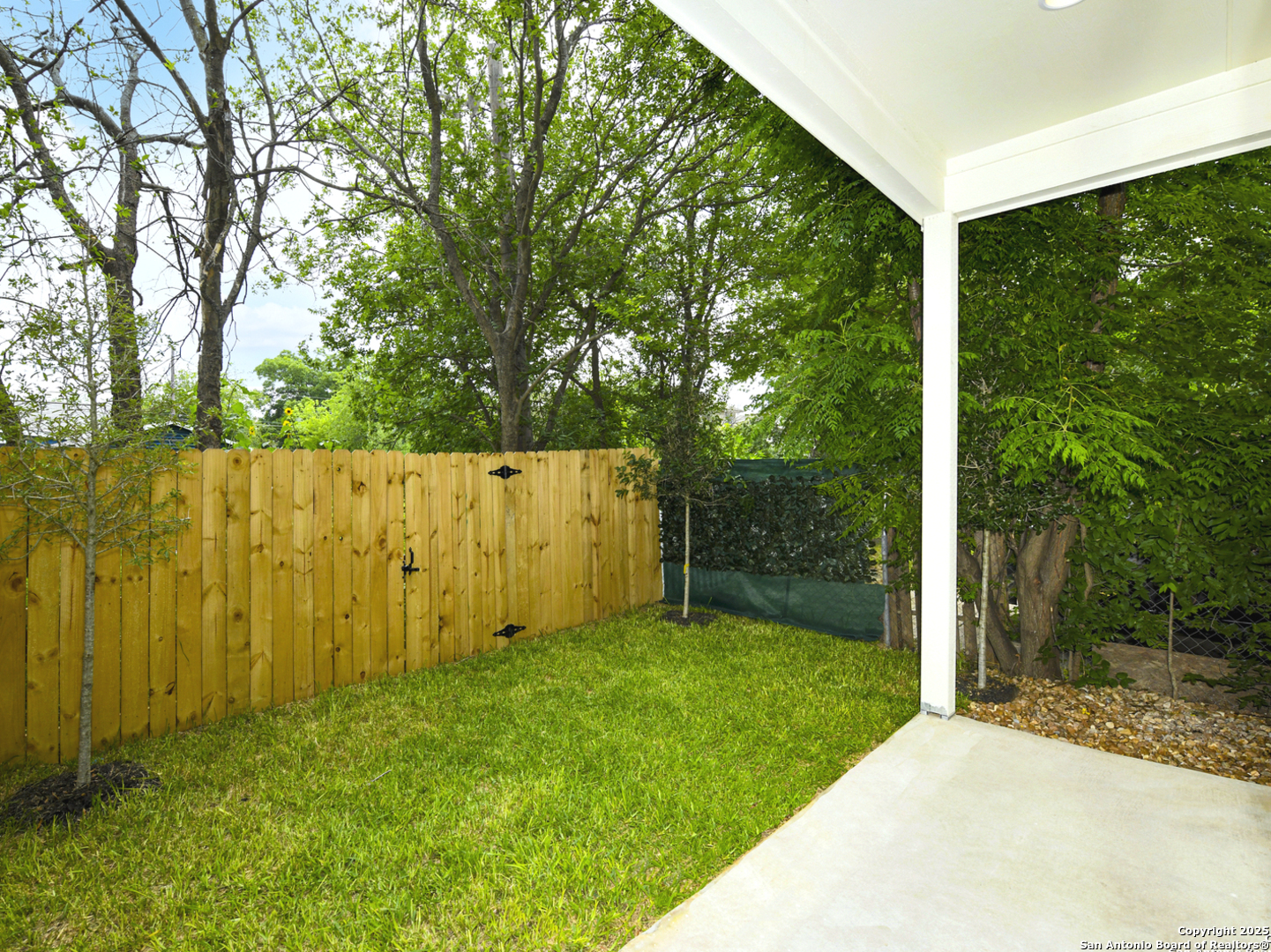 1430 Hays Street, Unit 101 San Antonio, TX 78202 - Photo 7 of 25 a view of backyard with tub and trees