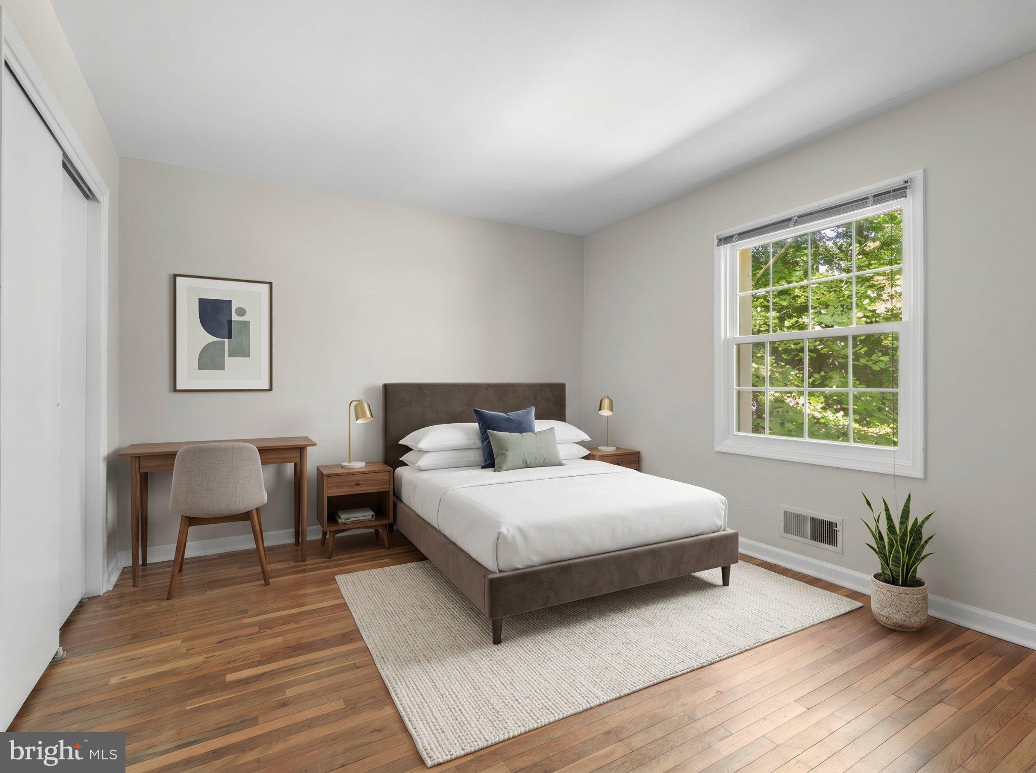 8221 Tory Road, Unit 150 Springfield, VA 22152 - Photo 27 of 36 Serene bedroom with natural light.