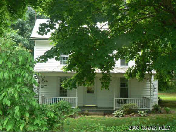 1762 Summerdean Road Middlebrook, VA 24459 - Photo 1 of 11 front view of a house with a tree