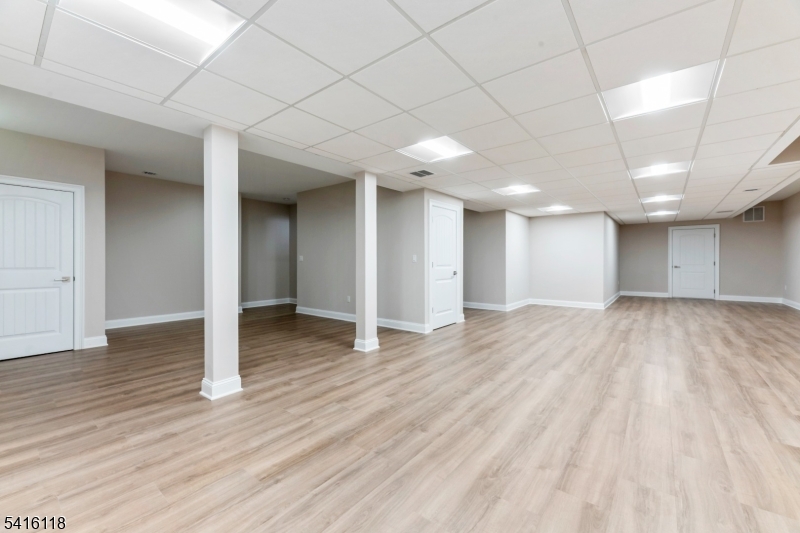 118 Cambridge Road Westfield, NJ 07090 - Photo 41 of 50 a view of empty room with wooden floor