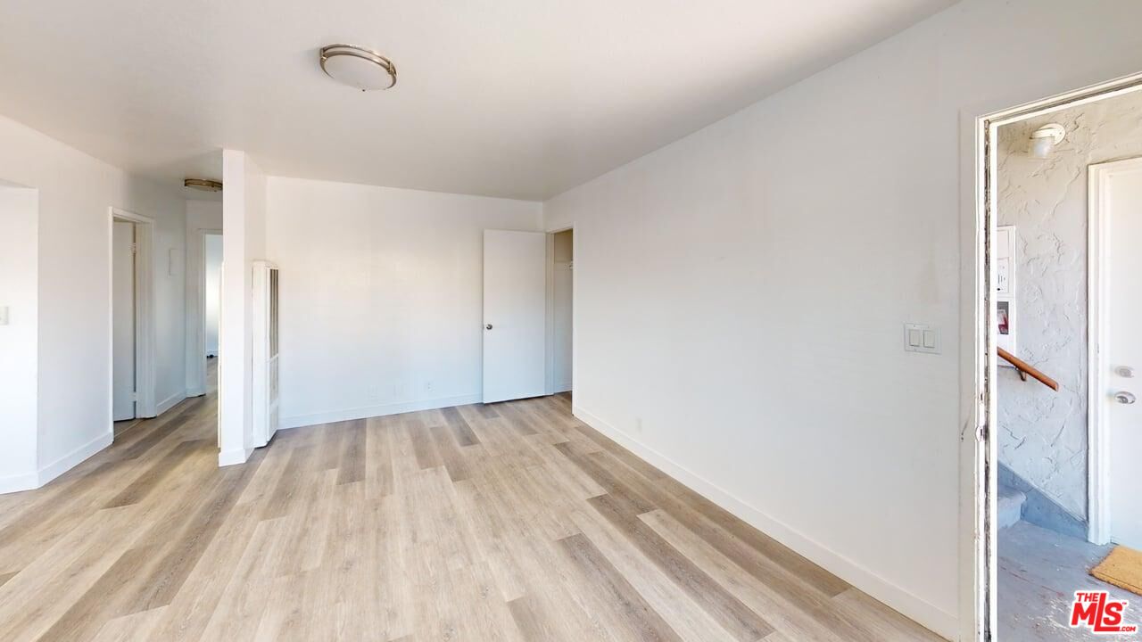 2129 Monroe Street Santa Clara, CA 95050 - Photo 11 of 12 a view of an empty room and wooden floor