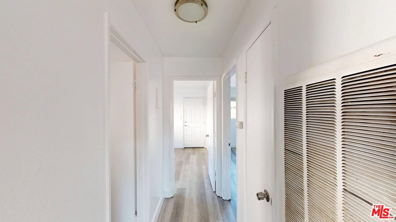 2129 Monroe Street Santa Clara, CA 95050 - Photo 5 of 12 a bathroom with a granite countertop shower and a window