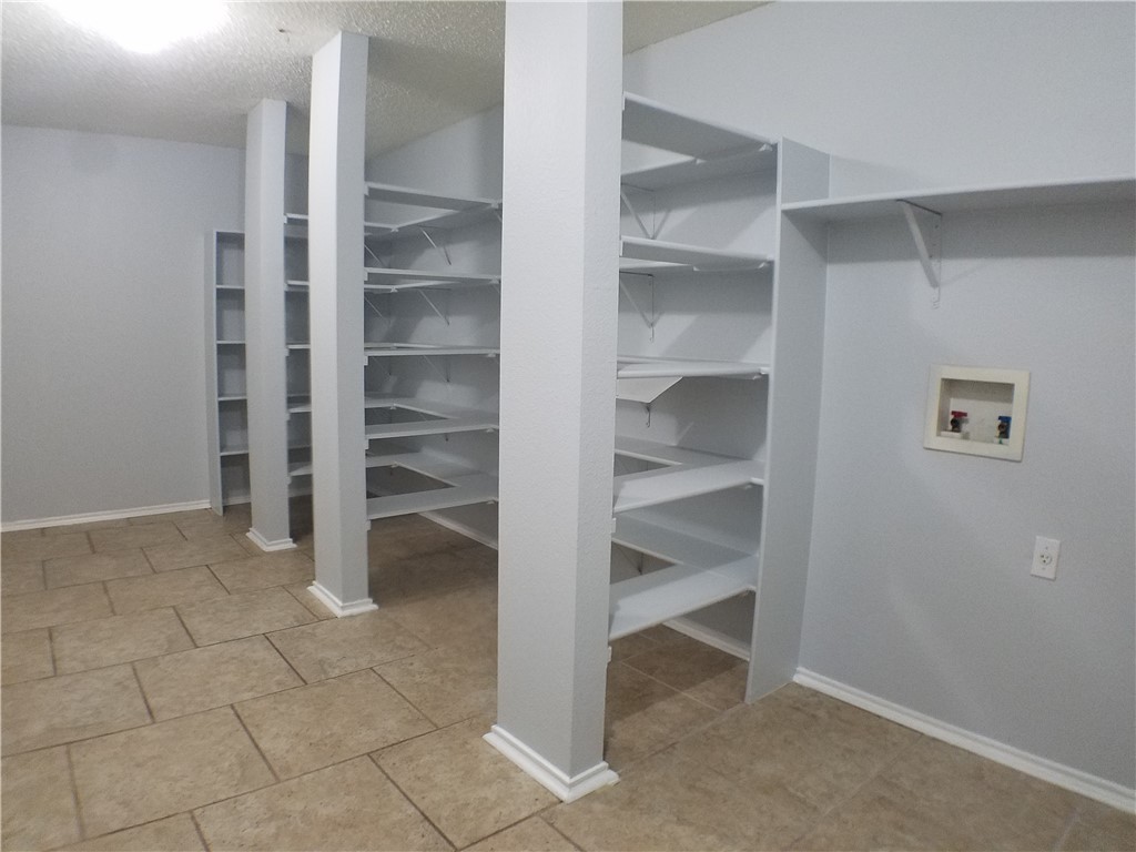 1113 Stillwell Ridge Cedar Park, TX 78613 - Photo 11 of 32 a view of an empty walk in closet