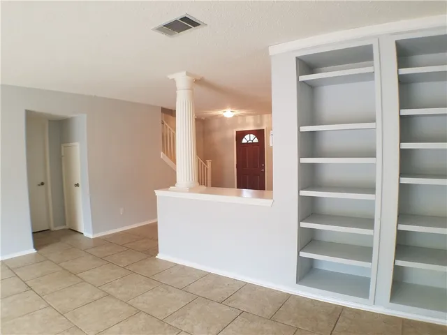 a view of a hallway with closet