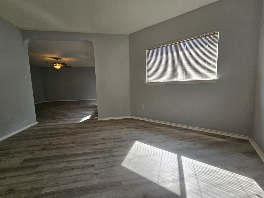 1113 Stillwell Ridge Cedar Park, TX 78613 - Photo 16 of 32 a view of empty room with wooden floor and fan