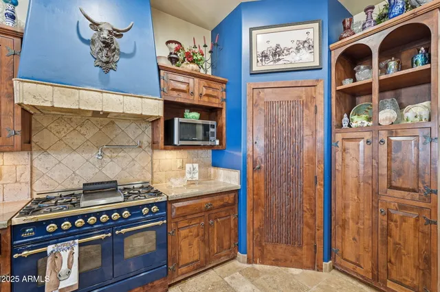 a view of a house with outdoor space and ocean view
