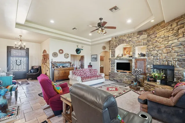 a kitchen with stainless steel appliances granite countertop a stove and cabinets