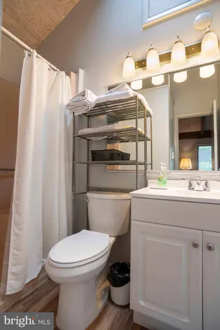 a view of a two chairs in the balcony