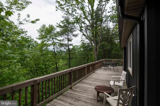 a view of room with window and hardwood floor