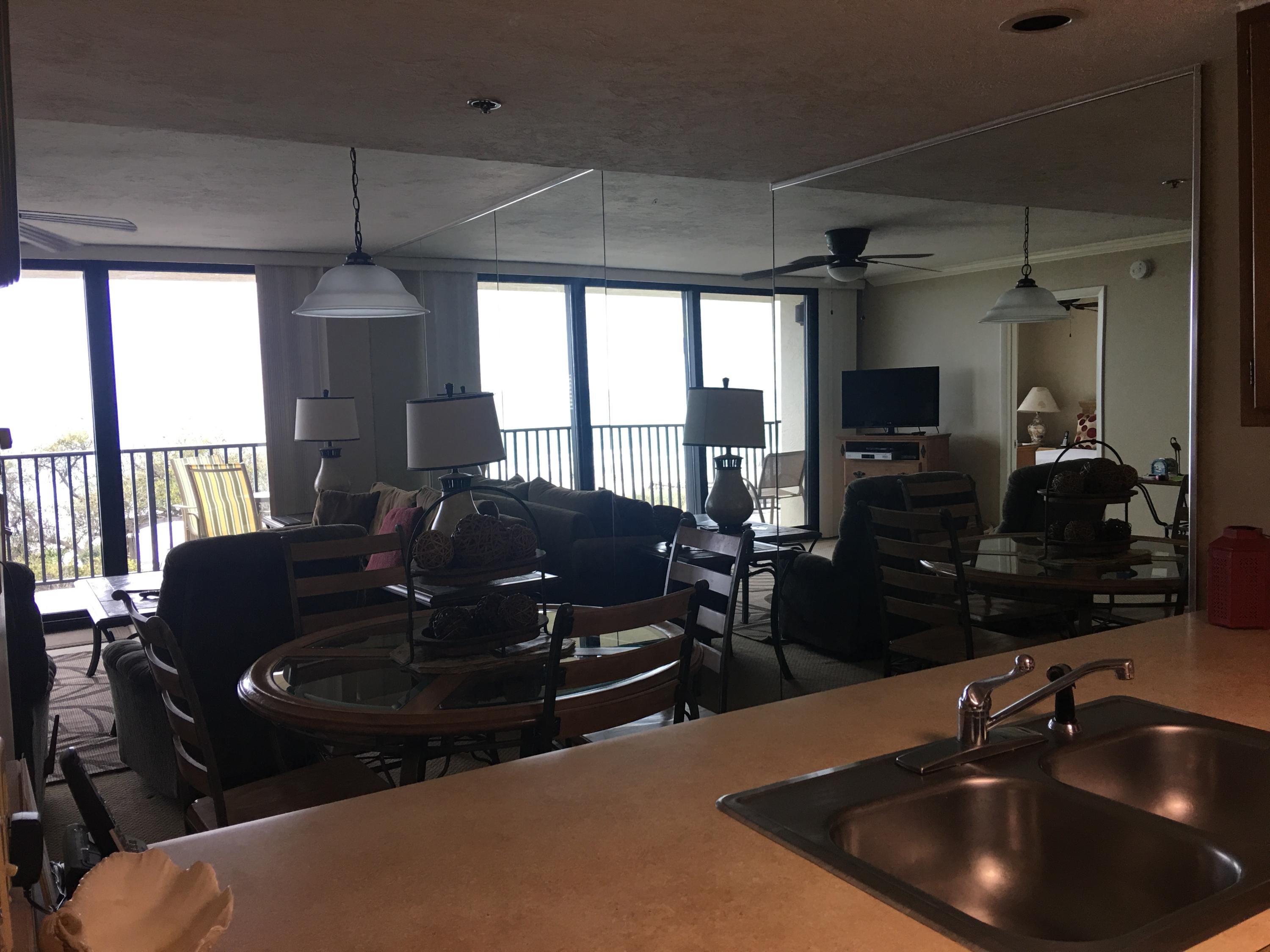 4100 East County Highway 30A, Unit 204 Santa Rosa Beach, FL 32459 - Photo 2 of 27 a living room with furniture and a flat screen tv