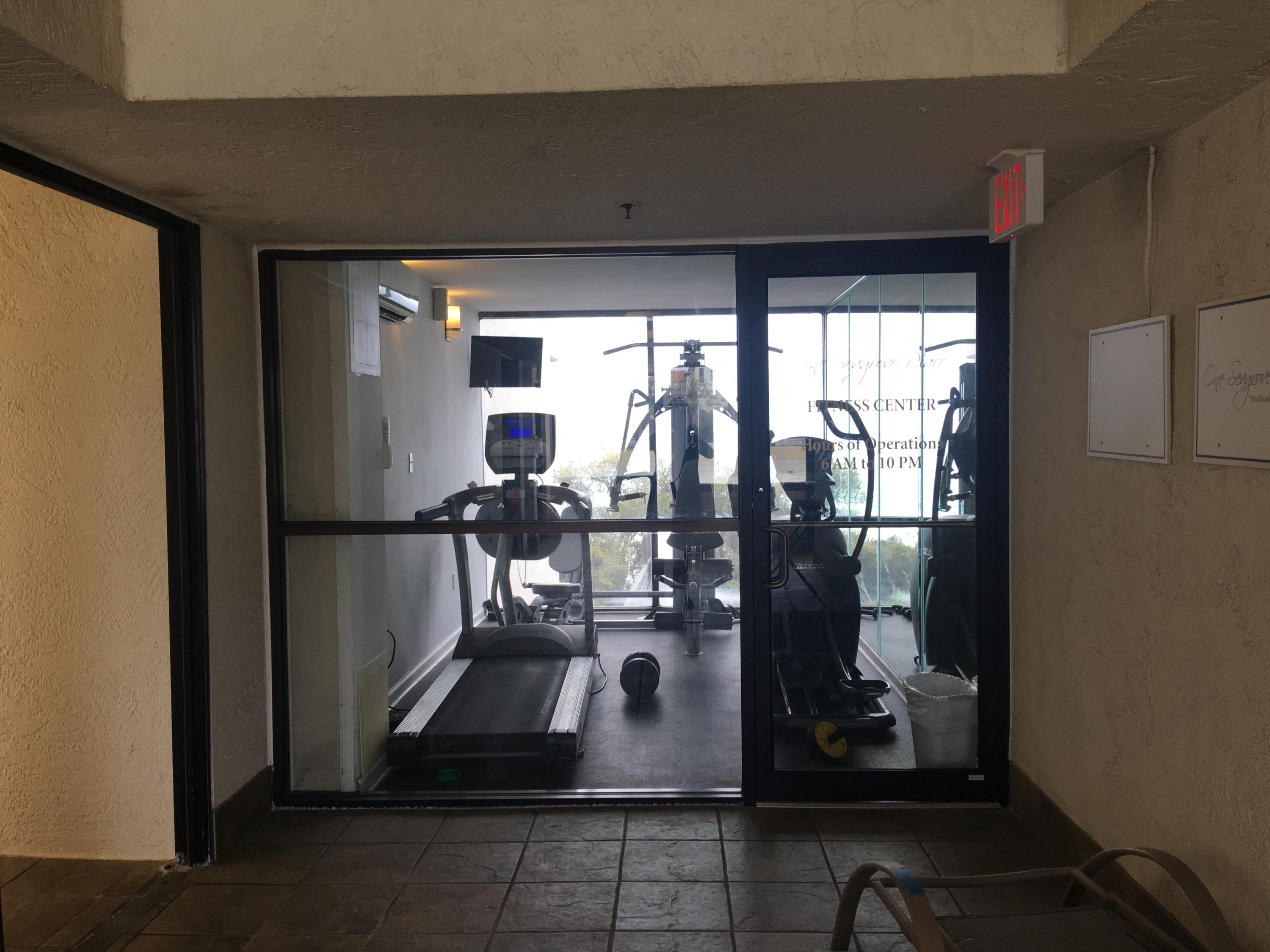 4100 East County Highway 30A, Unit 204 Santa Rosa Beach, FL 32459 - Photo 20 of 27 a kitchen with a refrigerator and wooden floor