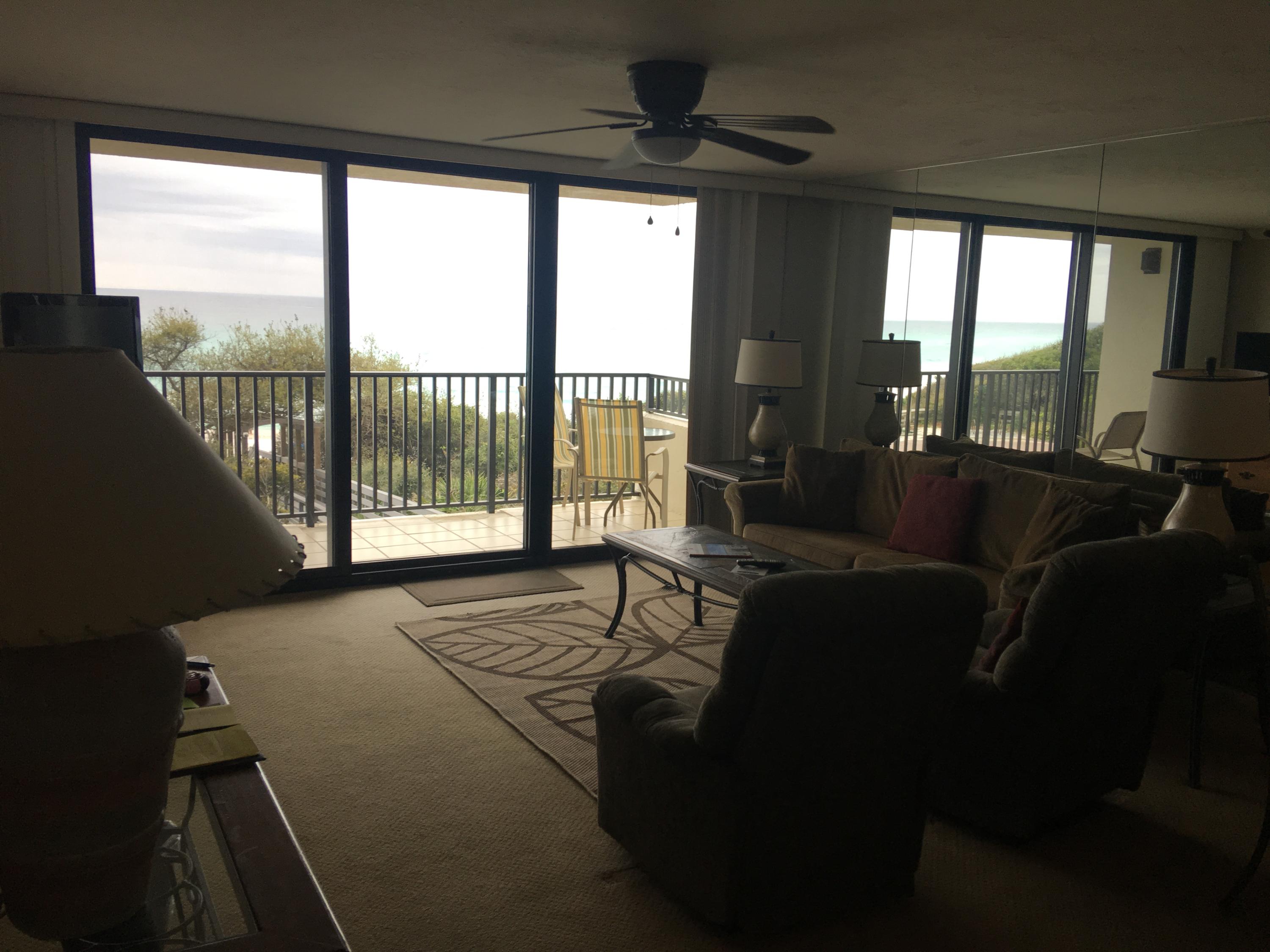 4100 East County Highway 30A, Unit 204 Santa Rosa Beach, FL 32459 - Photo 4 of 27 a bed sitting in front of a window