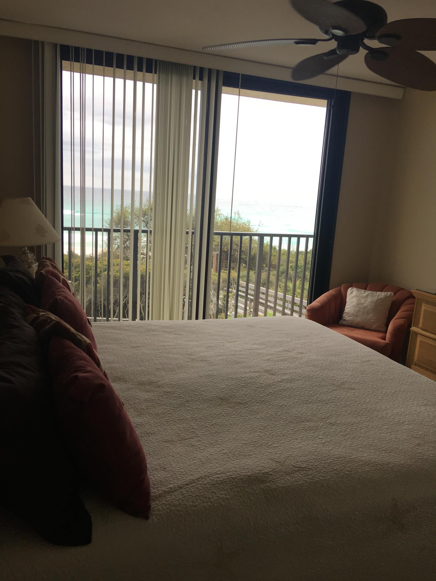 4100 East County Highway 30A, Unit 204 Santa Rosa Beach, FL 32459 - Photo 8 of 27 a bedroom with a bed and a large window