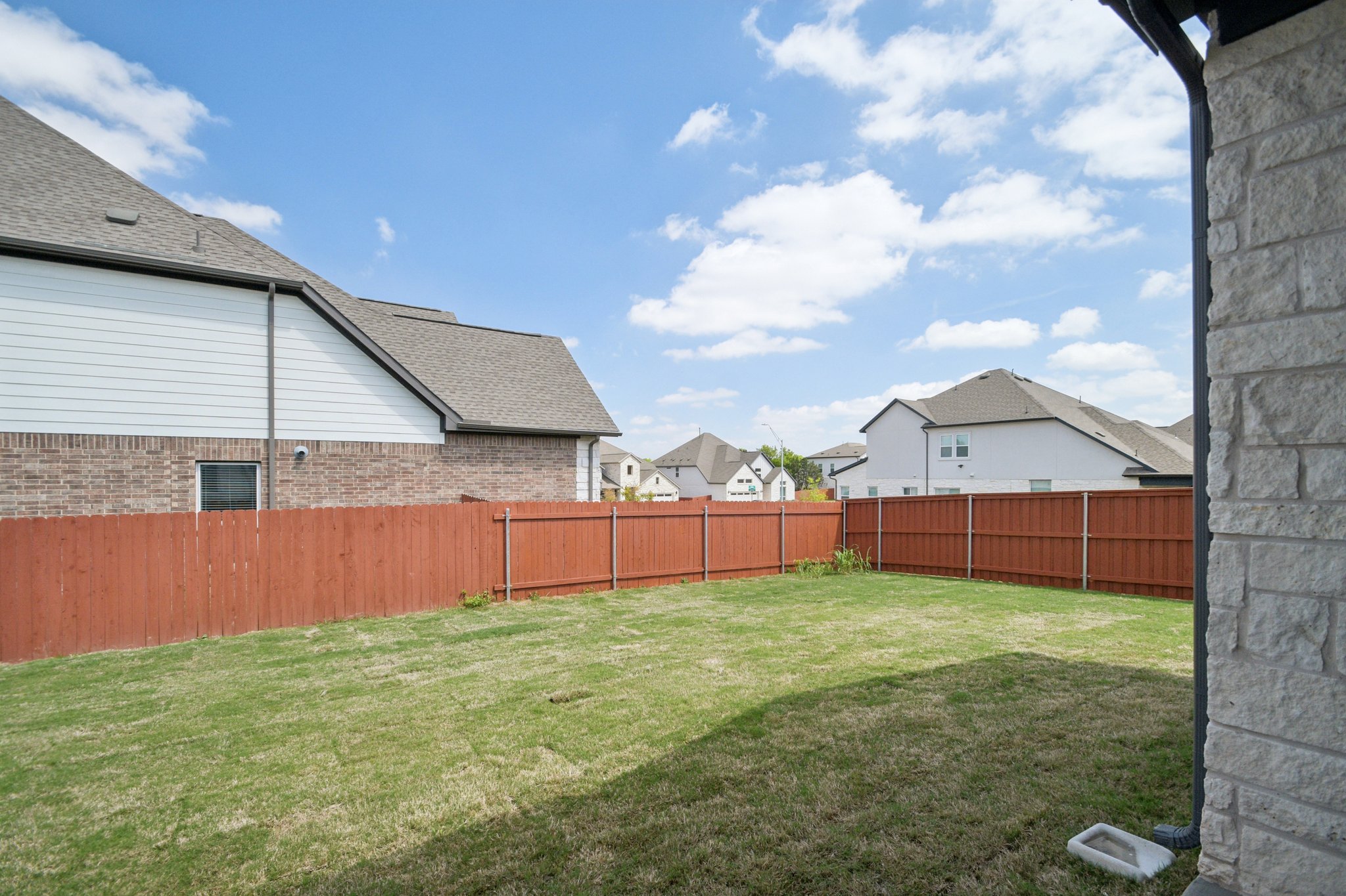 1660 Cardinal Lane Round Rock, TX 78681 - Photo 34 of 35 a view of a backyard of the house