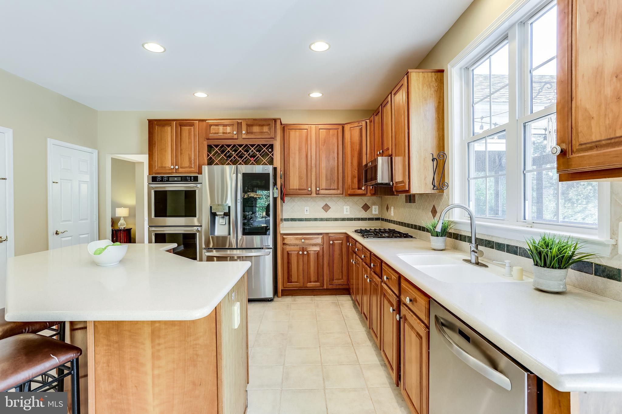 1101 Longbow Road Mount Airy, MD 21771 - Photo 13 of 53 Maple cabinets with Corian counters