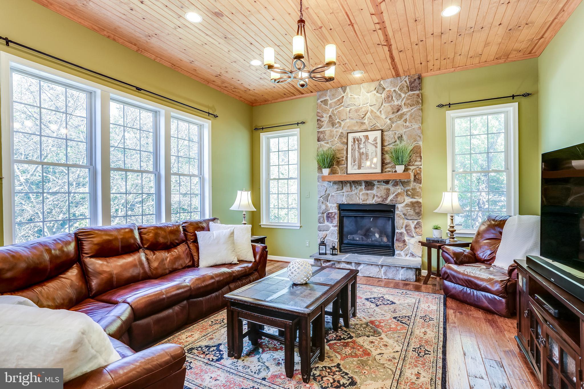 1101 Longbow Road Mount Airy, MD 21771 - Photo 16 of 53 Generous family room with stone gas fireplace