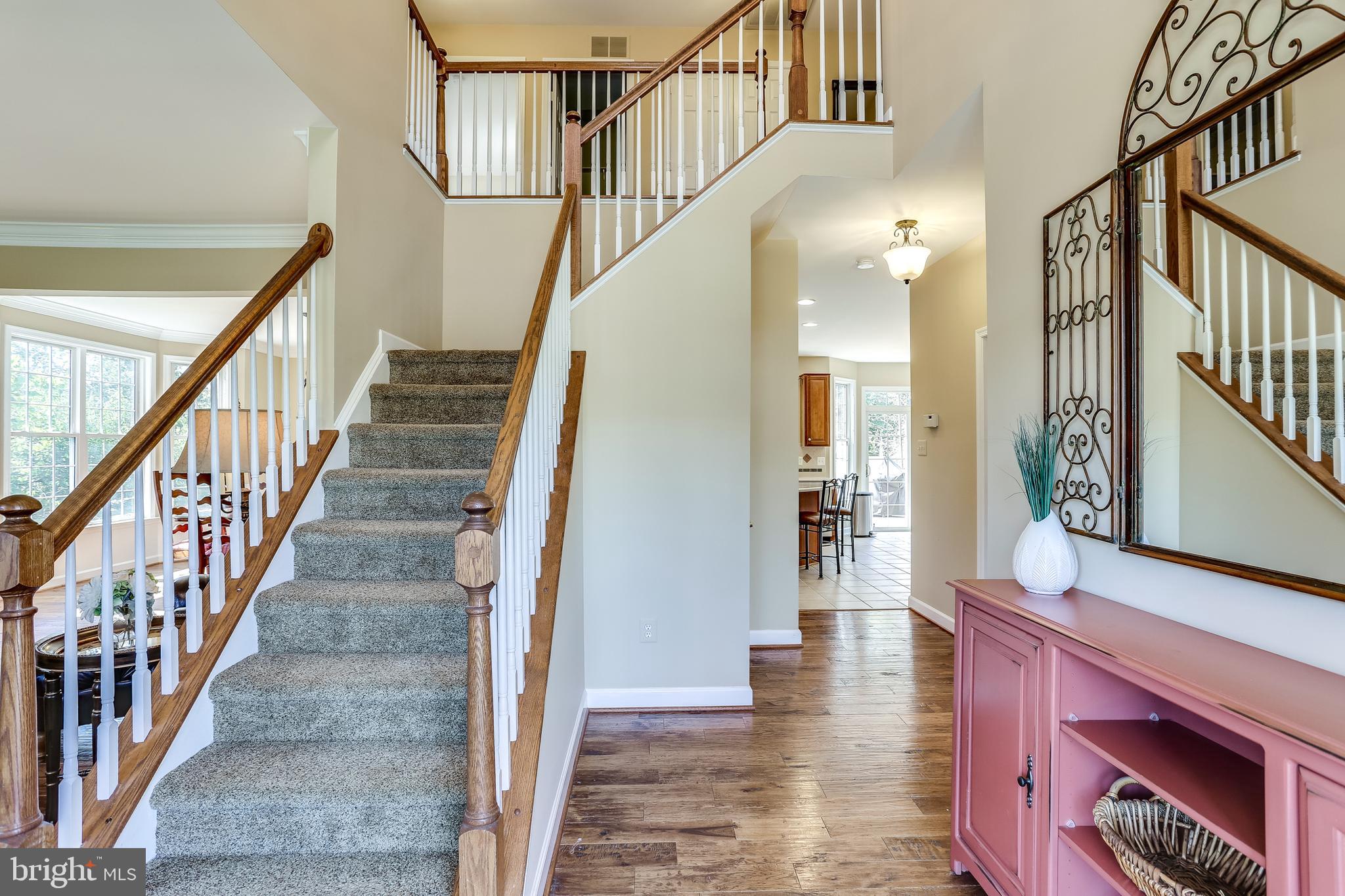 1101 Longbow Road Mount Airy, MD 21771 - Photo 5 of 53 Inviting foyer with gleaming hickory floors