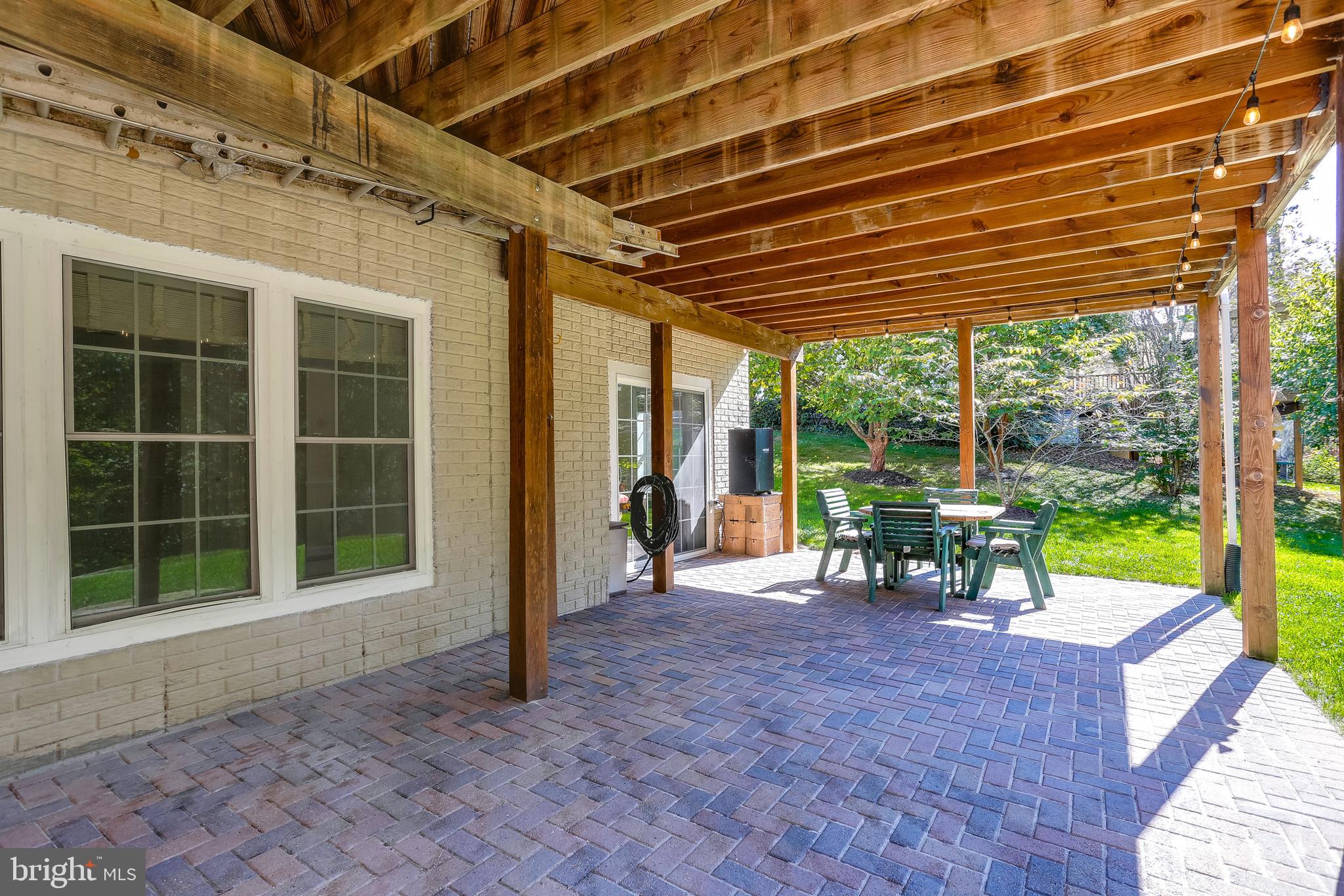 1101 Longbow Road Mount Airy, MD 21771 - Photo 44 of 53 Fully covered paver patio below the deck