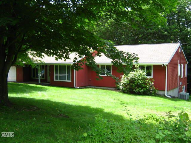 63 Hunters Mountain Road Oxford, CT 06478 - Photo 1 of 1 a view of a house with backyard and garden
