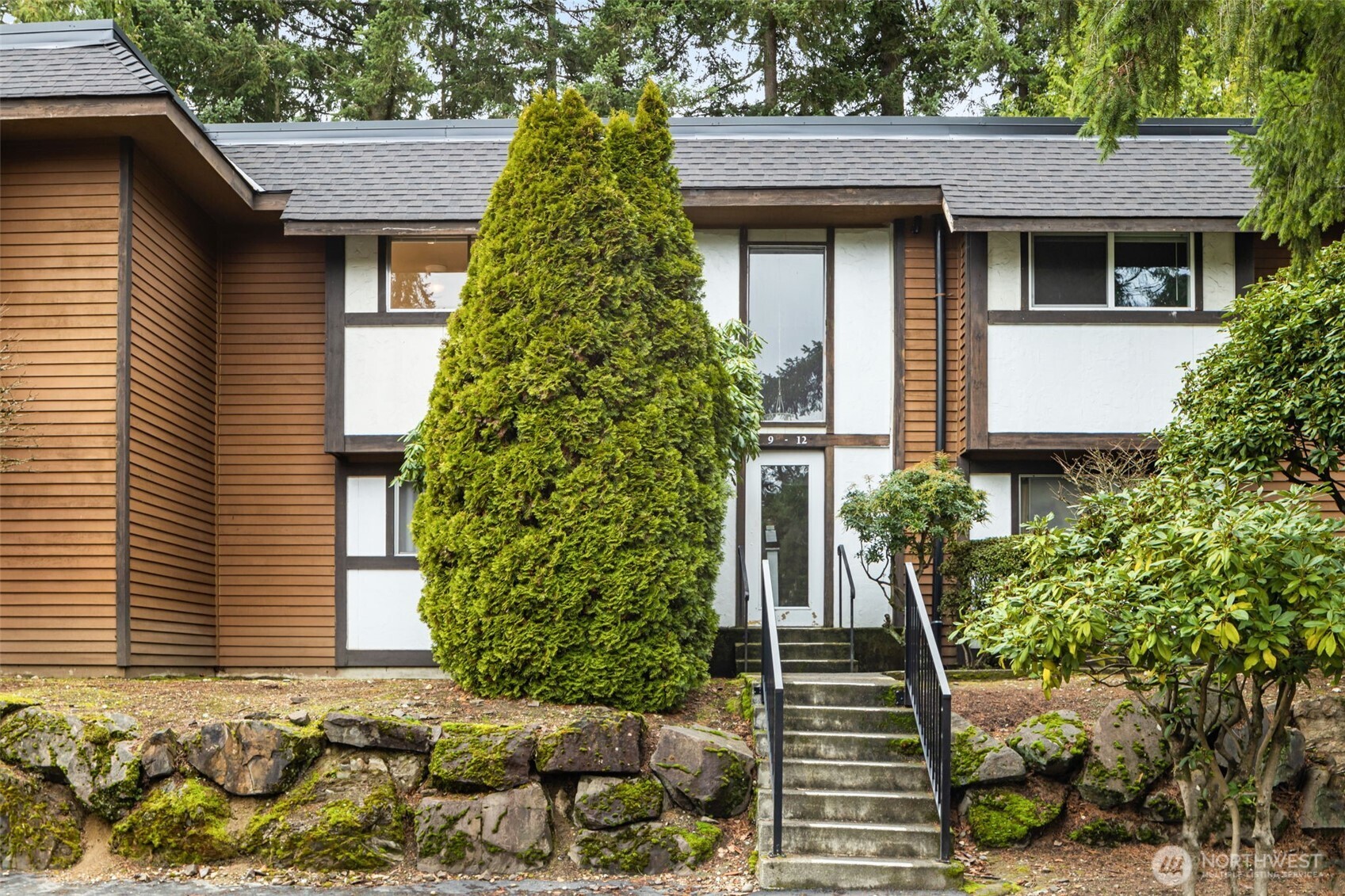 7309 224th Street Southwest, Unit E10 Edmonds, WA 98026 - Photo 2 of 11 a front view of a house