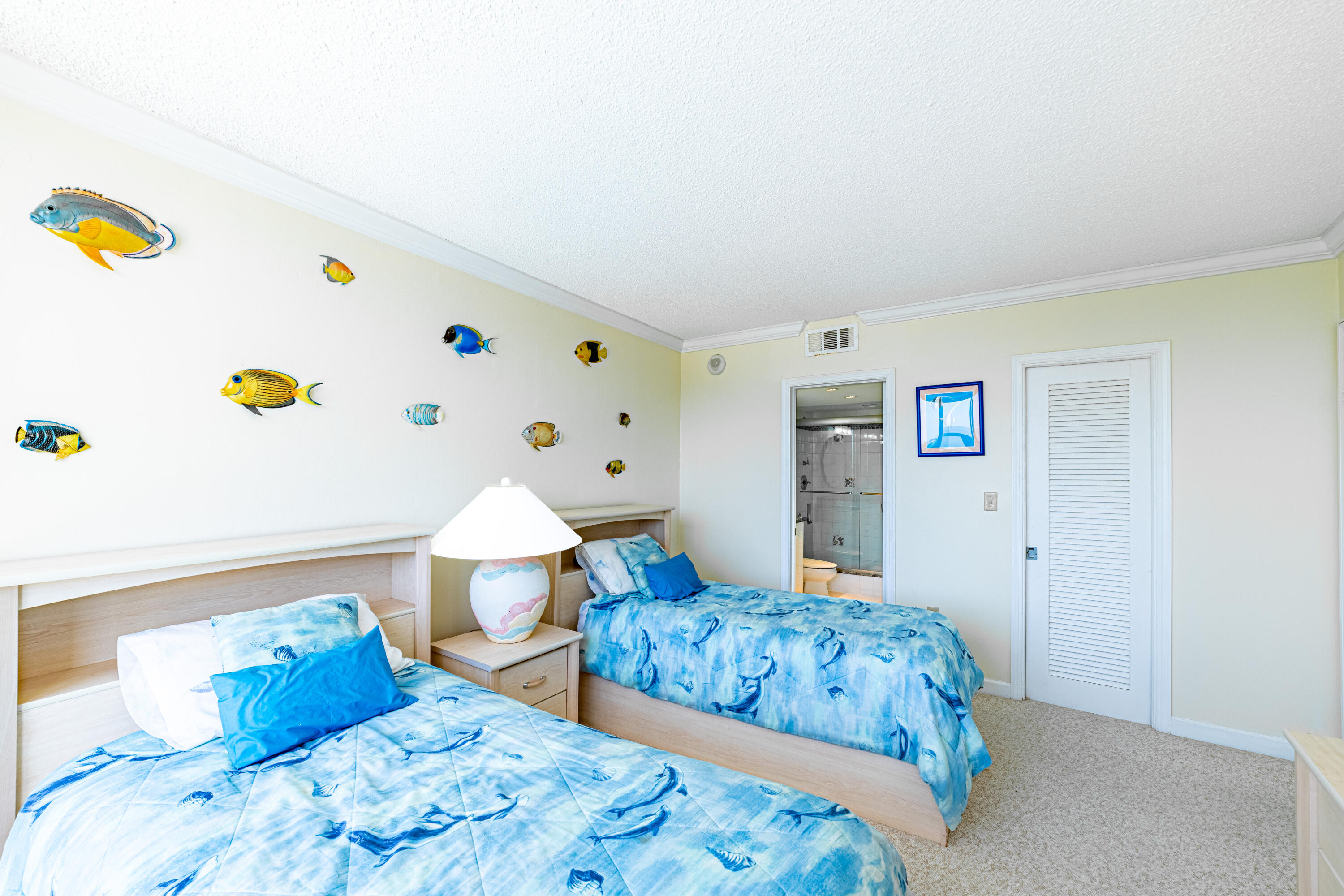 2780 South Ocean Boulevard, Unit 509 Palm Beach, FL 33480 - Photo 12 of 41 a bedroom with a bed and a dresser