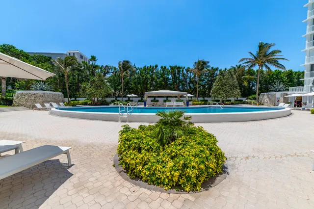 a view of a swimming pool and an outdoor space