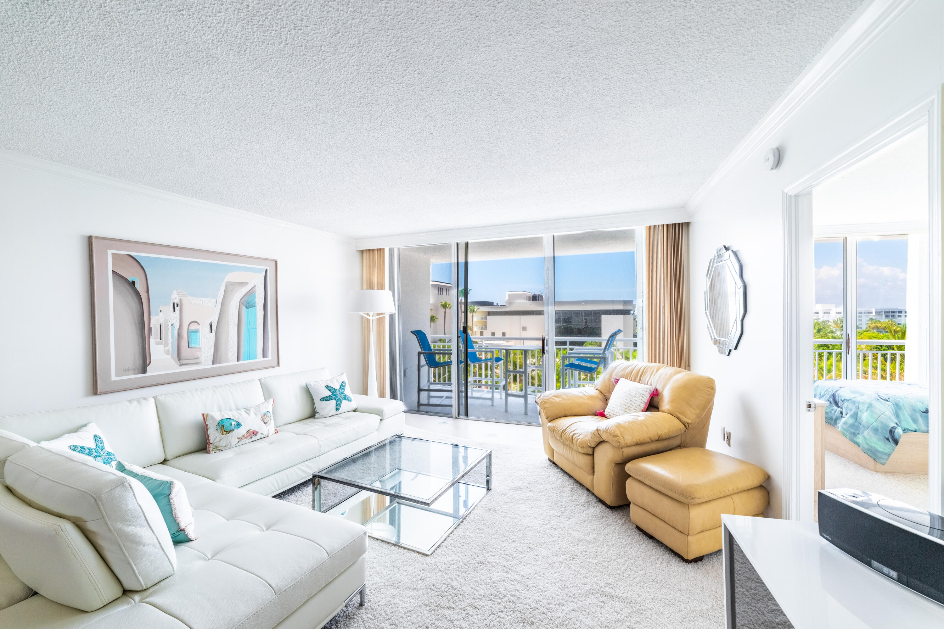 2780 South Ocean Boulevard, Unit 509 Palm Beach, FL 33480 - Photo 2 of 41 a living room with furniture and a large window