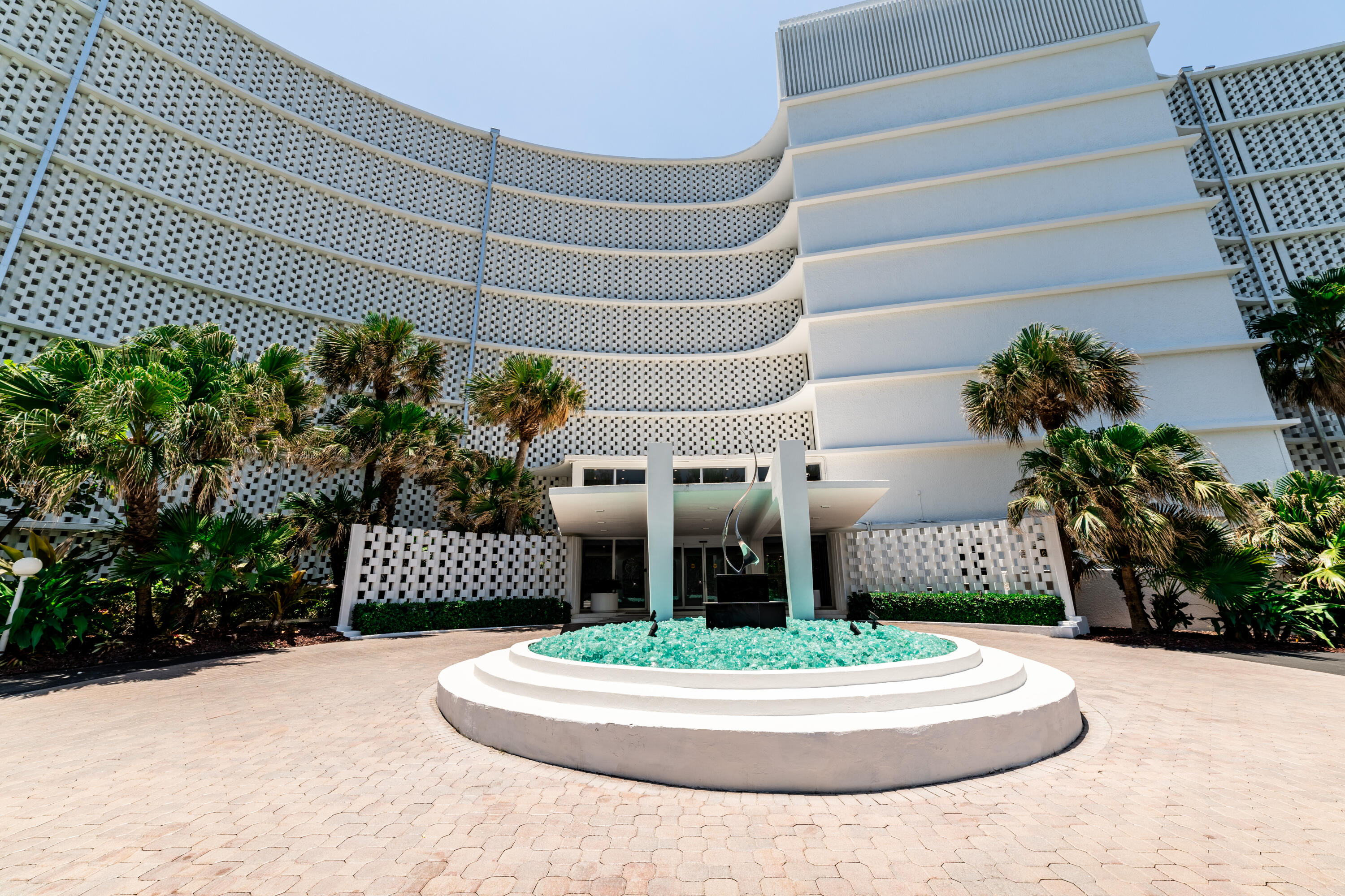 2780 South Ocean Boulevard, Unit 509 Palm Beach, FL 33480 - Photo 30 of 41 a building exterior with stairs and plants