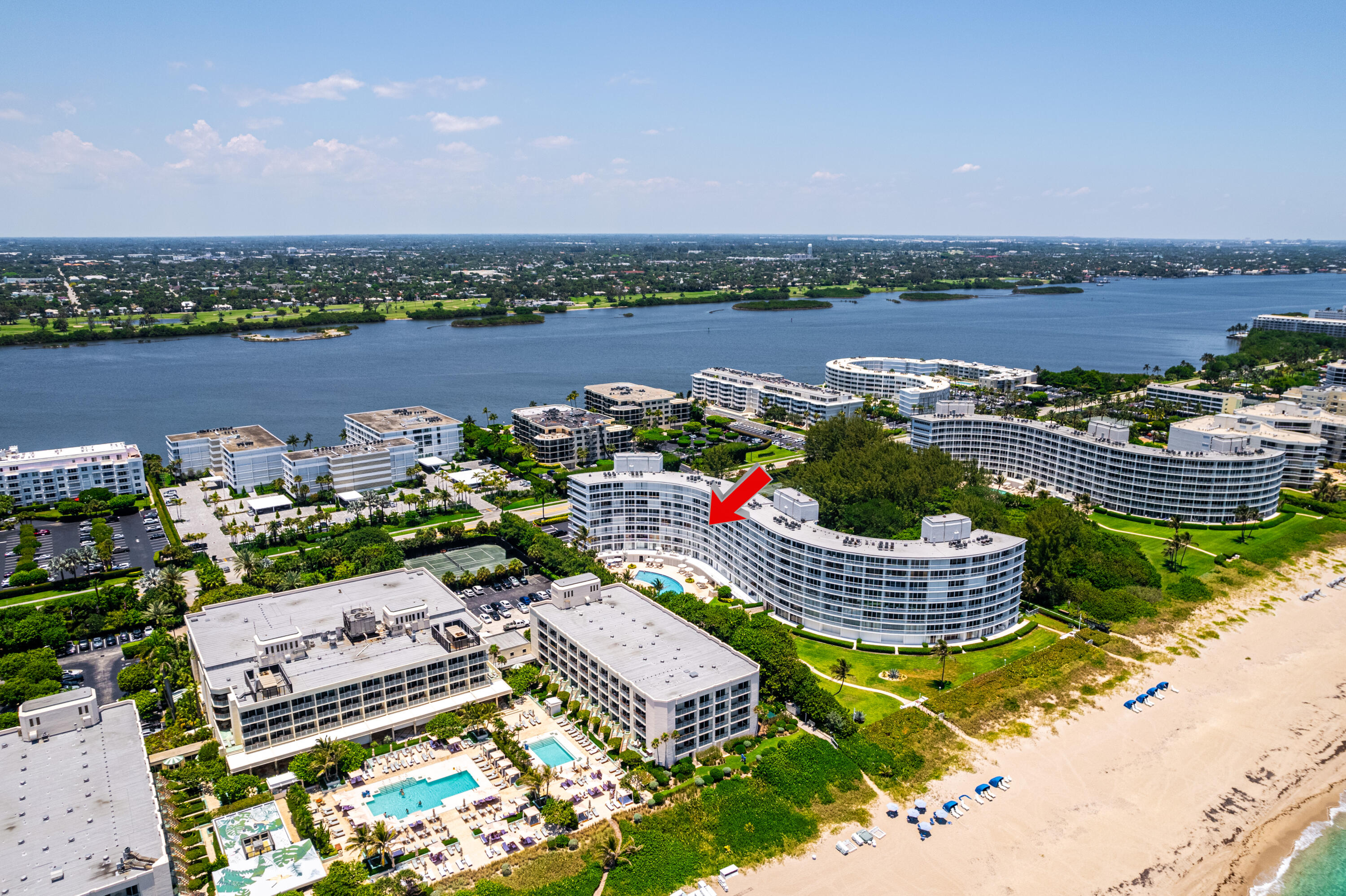 2780 South Ocean Boulevard, Unit 509 Palm Beach, FL 33480 - Photo 32 of 41 an aerial view of a house with a garden and lake view