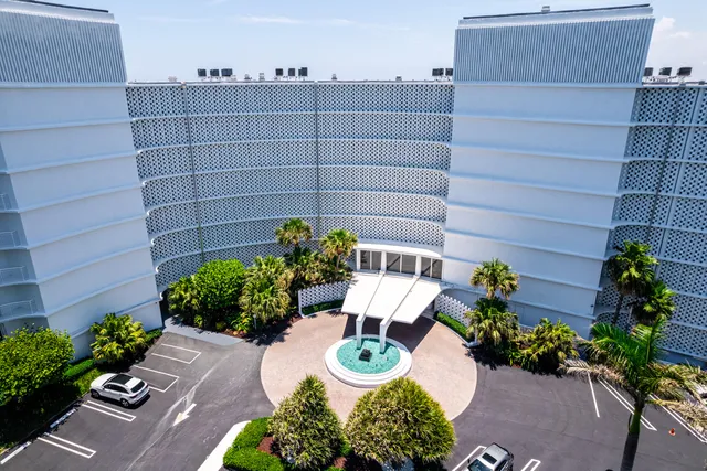 a view of a swimming pool and an outdoor space