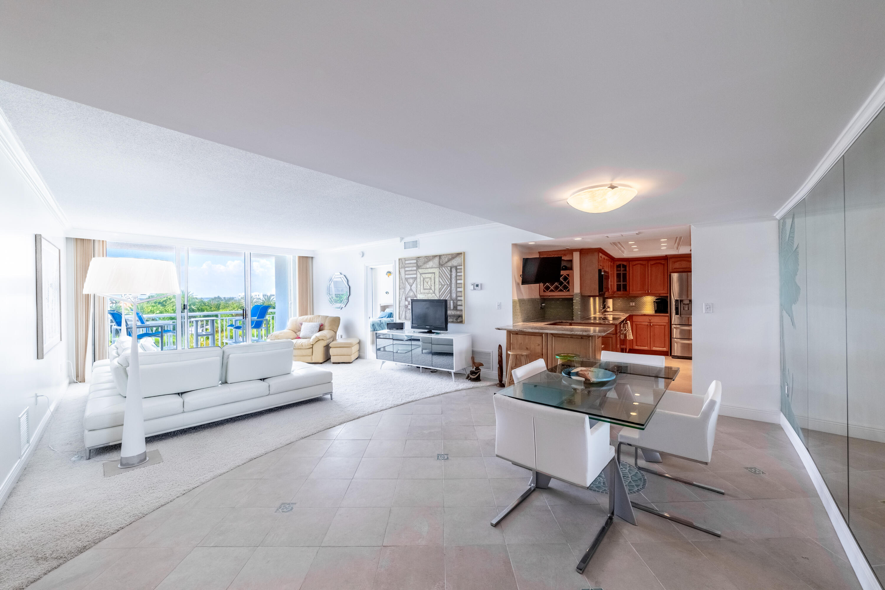 2780 South Ocean Boulevard, Unit 509 Palm Beach, FL 33480 - Photo 4 of 41 a living room with furniture and a large window