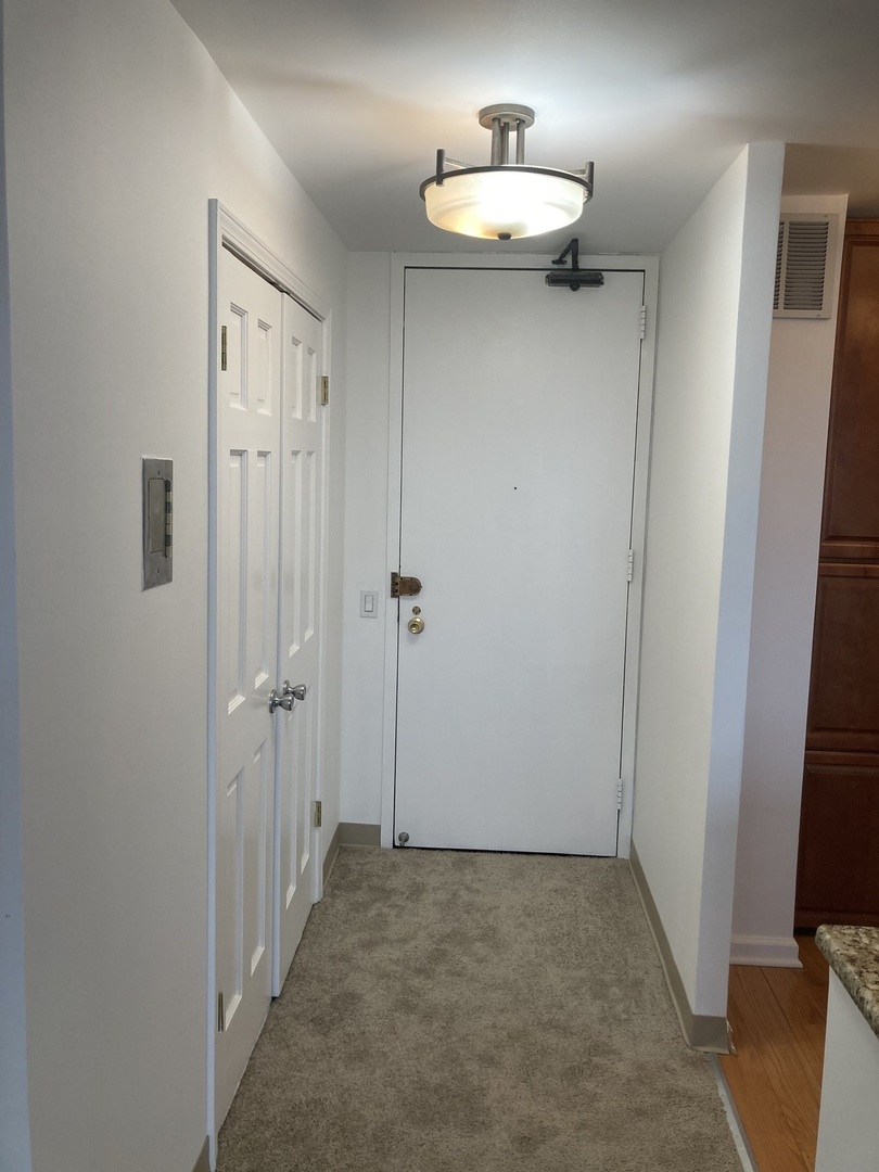 5445 North Sheridan Road, Unit 1409 Chicago, IL 60640 - Photo 6 of 7 a view of a room with a sink