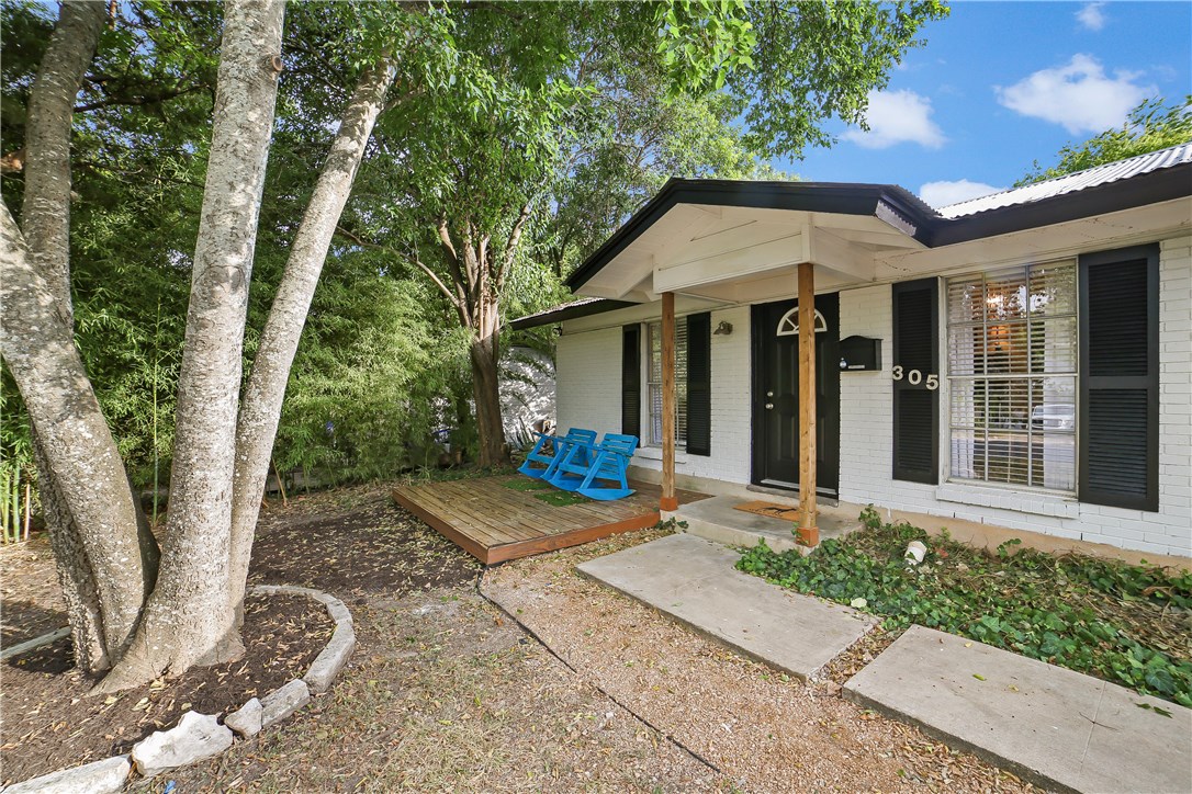 305 Lightsey Road Austin, TX 78704 - Photo 1 of 1 a view of a house with backyard and garden