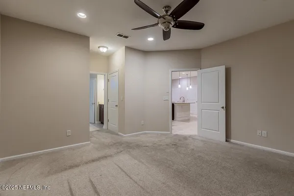 a view of a livingroom with a ceiling fan