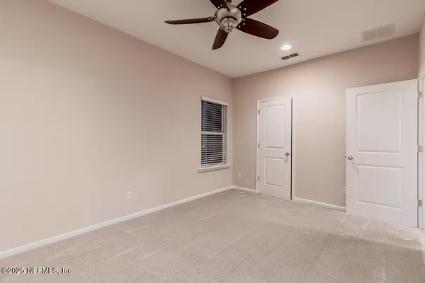 a bathroom with a toilet a sink and shower