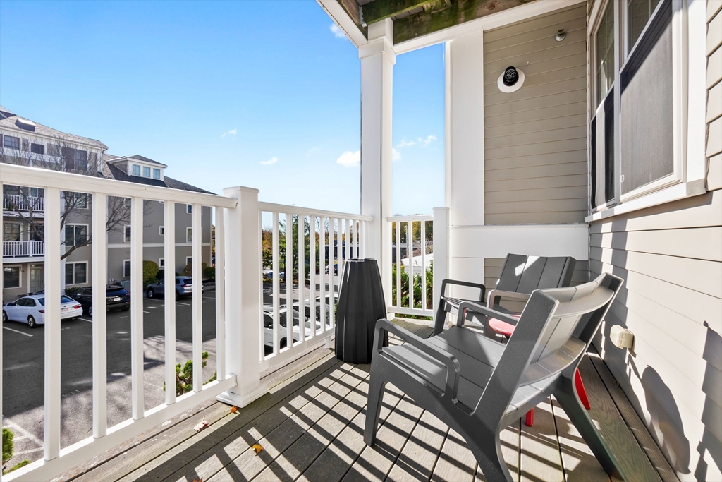 33 Intrepid Circle, Unit 208 Marblehead, MA 01945 - Photo 14 of 35 a view of balcony with couch